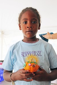 Cute girl with pumpkin