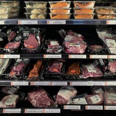 The inside of a meat and seafood refrigerator