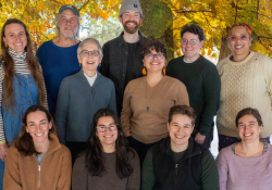 MNFC board in front of fall foliage